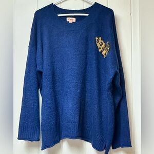 Adorable blue sweater with animal print heart